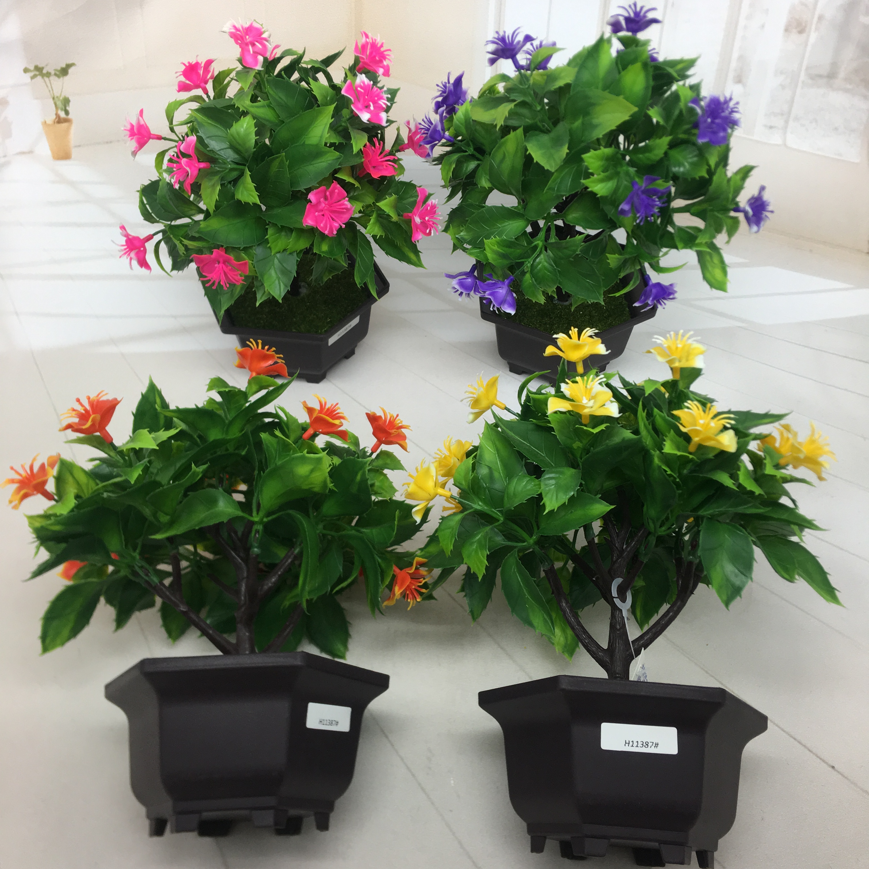 Mini artificial bonsai flowers, small potted plants, factory direct sales of artificial flower plants Item Picture