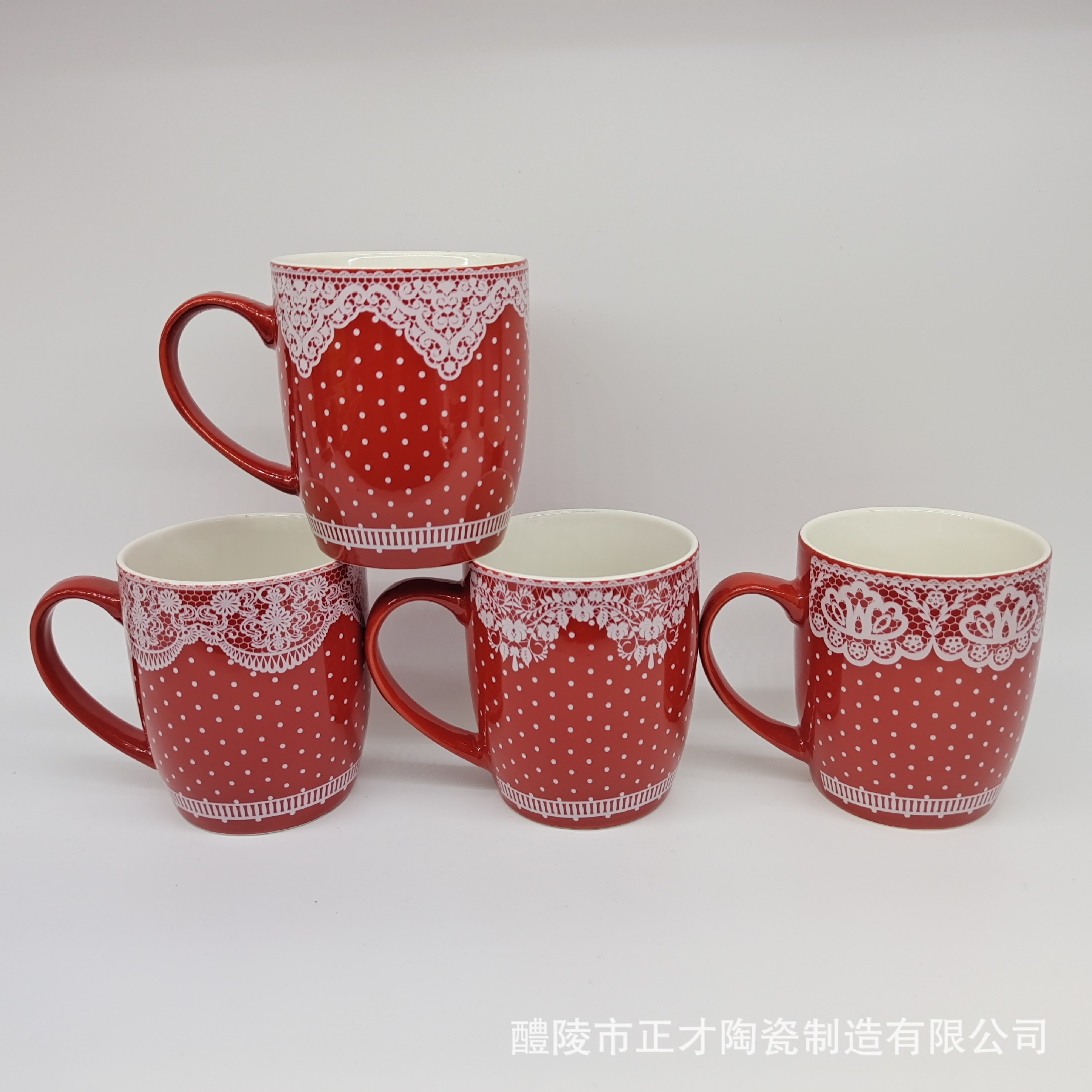 Wholesale of red ceramic mugs and white lace ceramic cups in stock. Factory direct sales details Picture