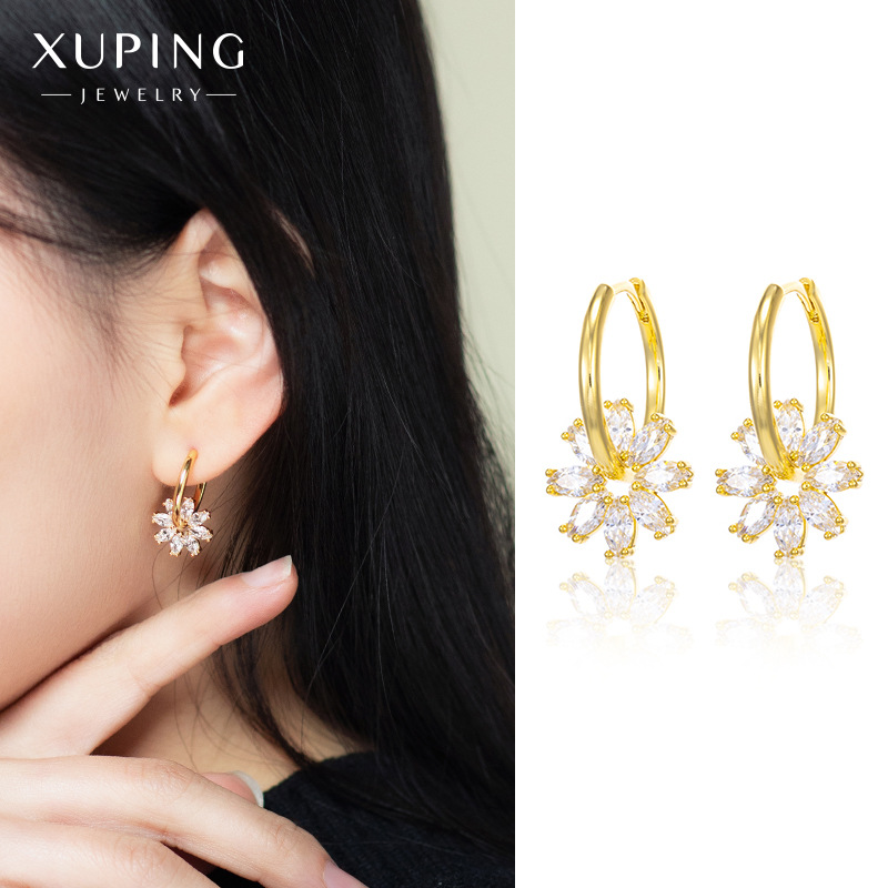 Xuping Jewelry's new 24K-colored earrings, set with zircon, exude a retro charm. They are detachable and dual-purpose windmill earrings for women