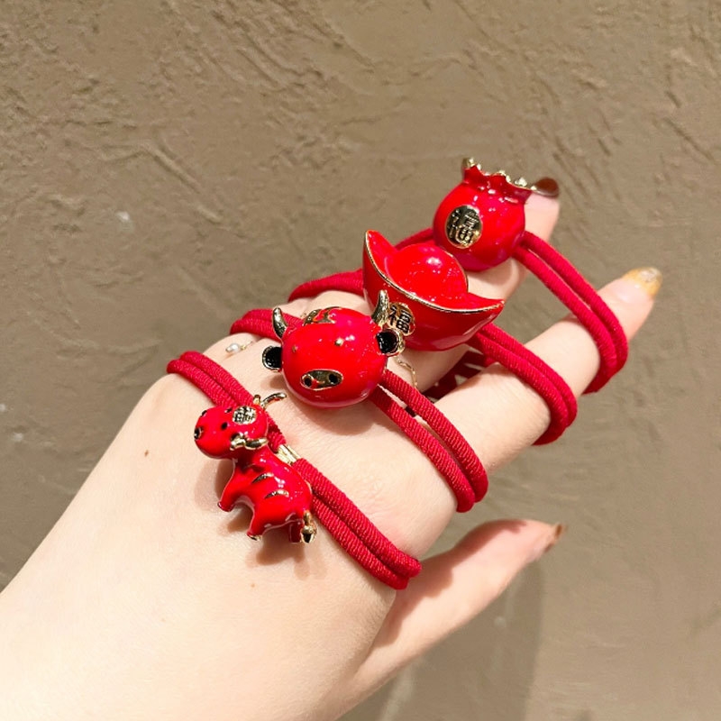 Korean New Year red string hair band, New Year of the Ox zodiac year headband, bracelet style rubber band, new bun hairstyle New Year's Eve headwear full figure