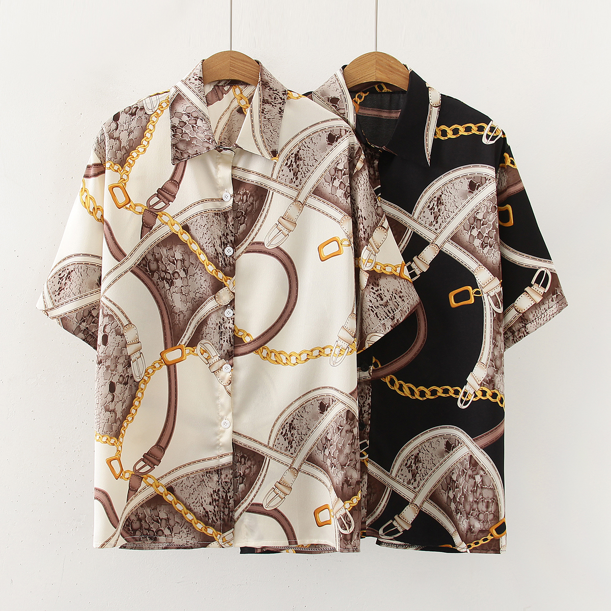 In stock, this is a niche Korean-style shirt with a design sense. It's a mid-length, retro short-sleeved shirt for women, featuring chiffon sun protection