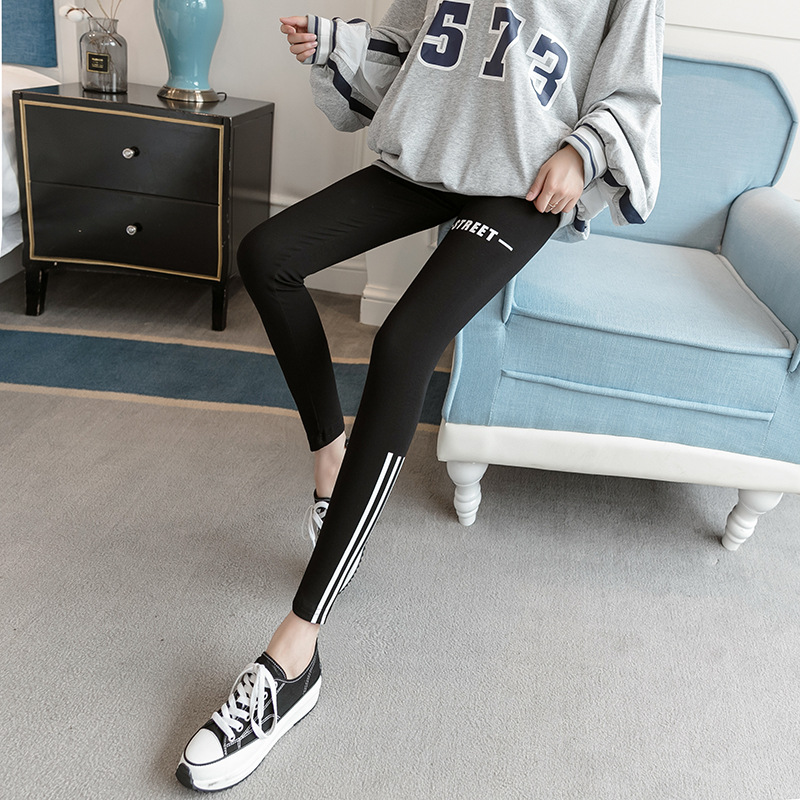Real photo of 2021 Spring Festival tight-fitting height, waist elasticity, slimming letter, seamless slimming legs, yoga, wearing leggings outside, female hair replacement details Picture