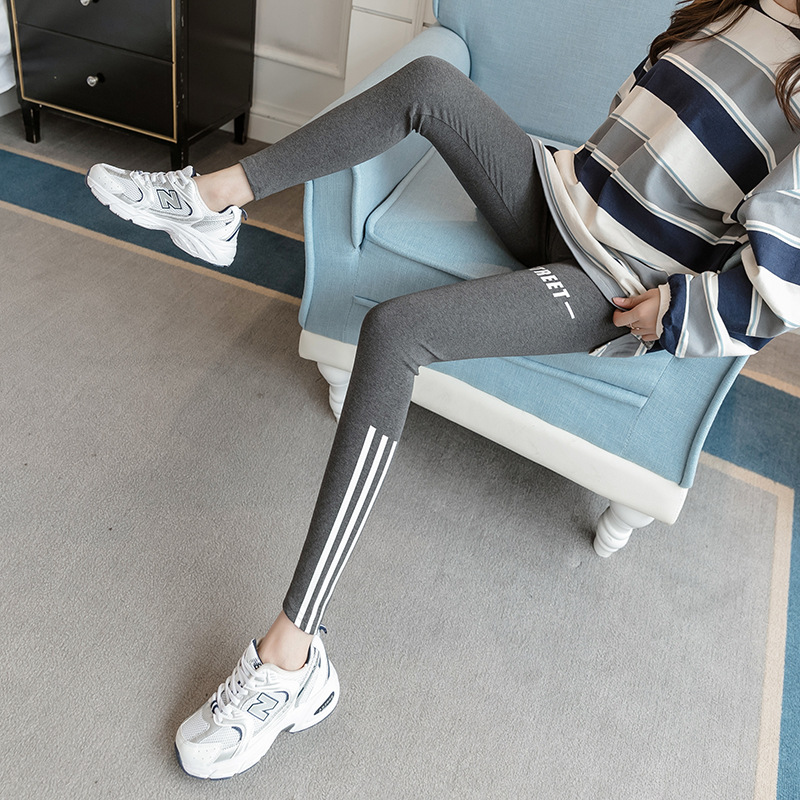 Real photo of 2021 Spring Festival tight-fitting height, waist elasticity, slimming letter, seamless slimming legs, yoga, wearing leggings outside, female hair replacement Specification image