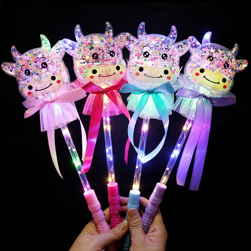 Wholesale of 2022 new children's toys, including flashing sticks, bouncy balls, cartoon Year of the Ox, and starry sky balls full figure