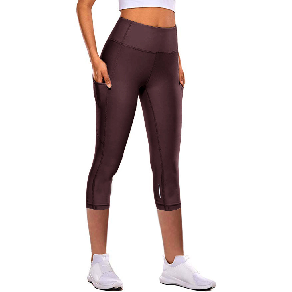 Wholesale of the latest high-waisted, hip-lifting seven-point yoga pants, women's tight-fitting pants, and sports and outdoor fitness leggings that are popular in Europe and America details Picture