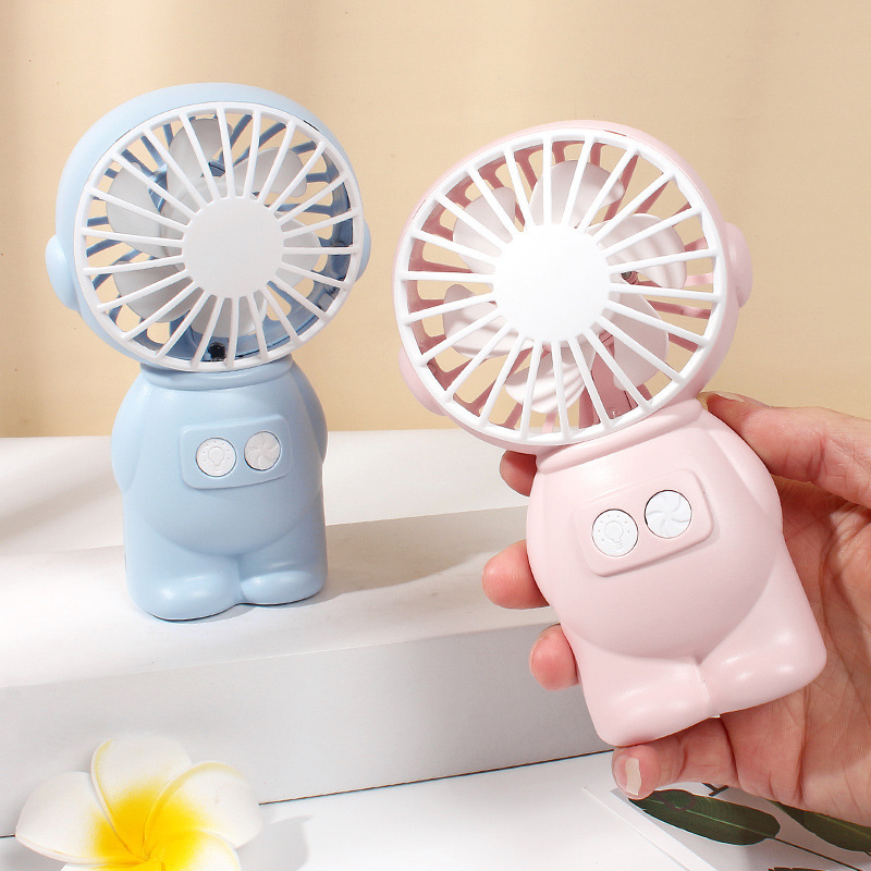 New USB handheld fan, portable outdoor handheld fan, mini creative desktop office charging night light fan Application Scenario