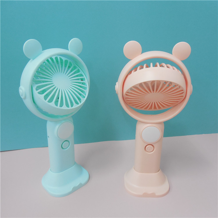Mini cartoon cat fan with LED night light, desktop phone stand, two-speed wind outdoor portable fan Application Scenario