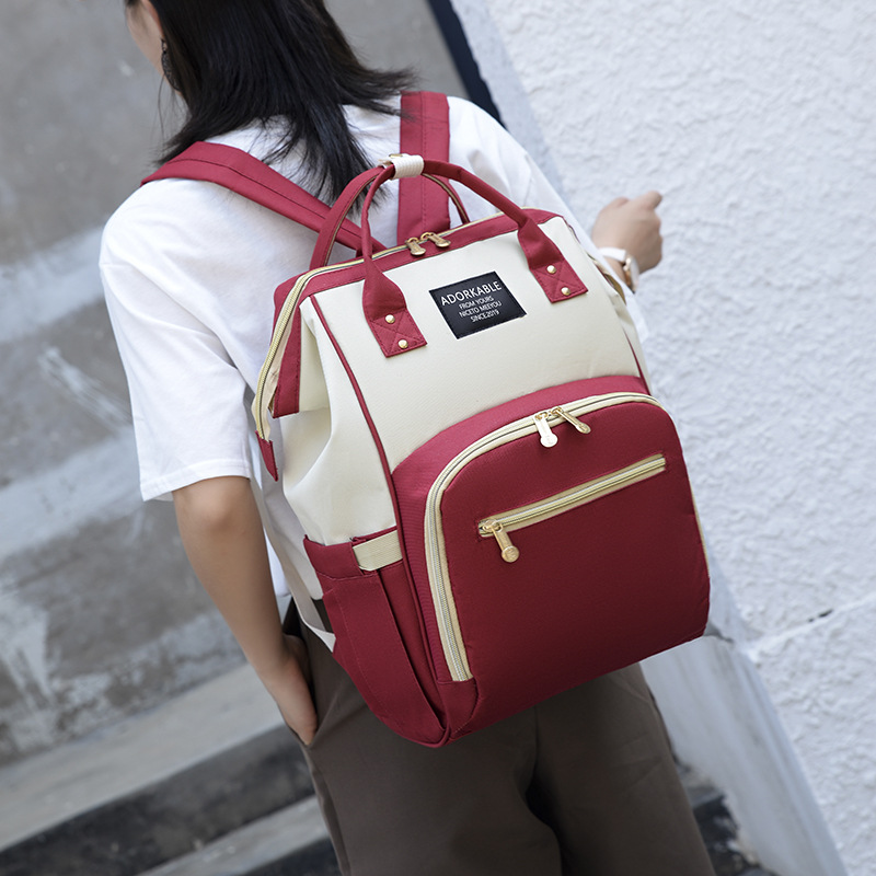 2021 Spring New lightweight Korean-style fashionable color-blocking mom bag, USB charging multi-functional outdoor mother and baby bag Specification image