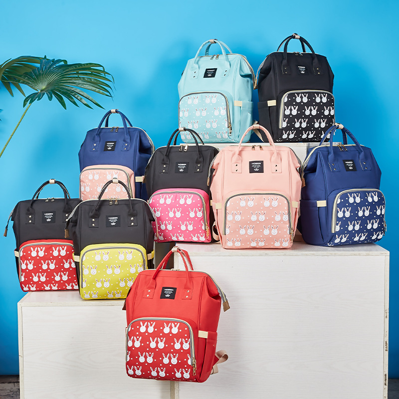 One-piece delivery of the new Korean version cartoon-printed mommy bag, trendy and casual backpack, multi-functional mother and baby bag details Picture