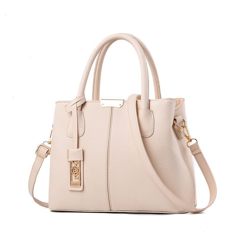 The 2021 new trendy women's handbag for middle-aged moms is fashionable, elegant and simple. It's a single-shoulder crossbody bag that goes well with women Application Scenario