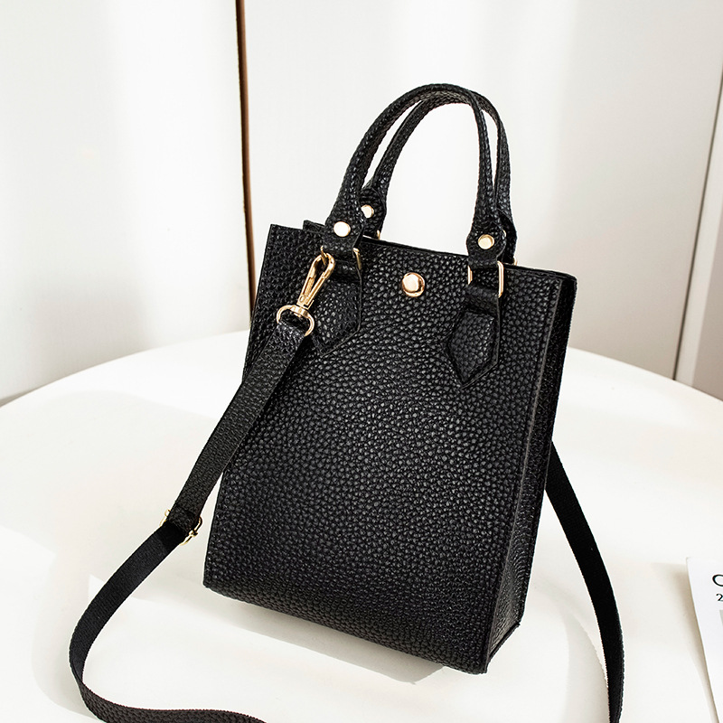 Women's bag 2021 New style lychee pattern hand-held crossbody small bucket bag, casual mobile phone bag, one piece consignment, foreign trade small bag details Picture