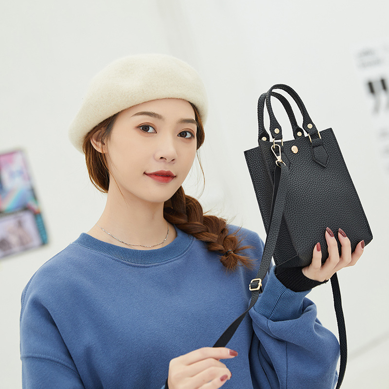 Women's bag 2021 New style lychee pattern hand-held crossbody small bucket bag, casual mobile phone bag, one piece consignment, foreign trade small bag Specification image