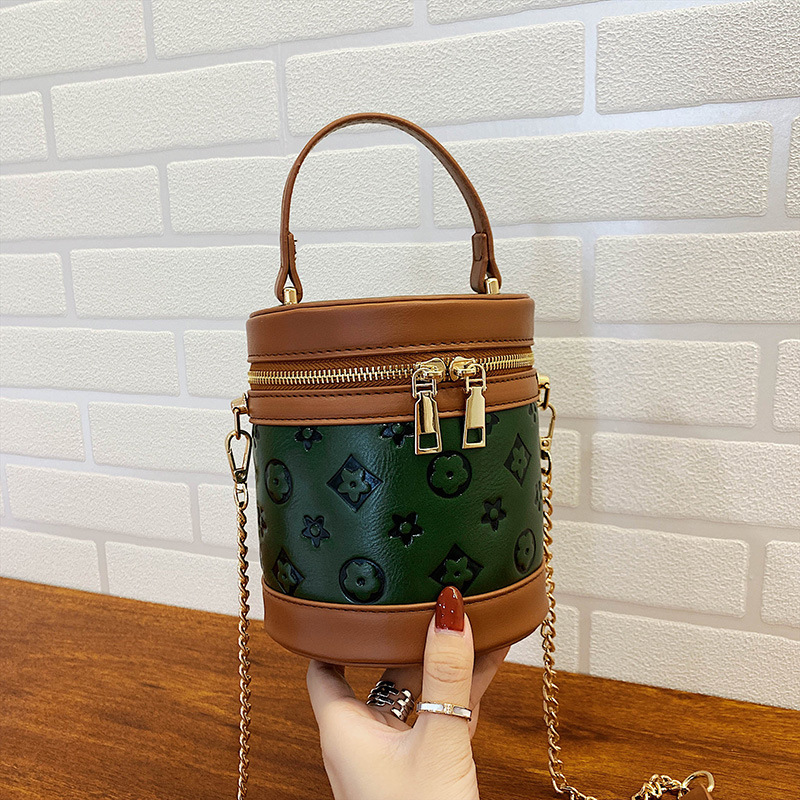 2021 Spring New trendy Korean-style cylindrical women's bag, single-shoulder bag, popular mini hand-held small bag, embossed women's bag Specification image