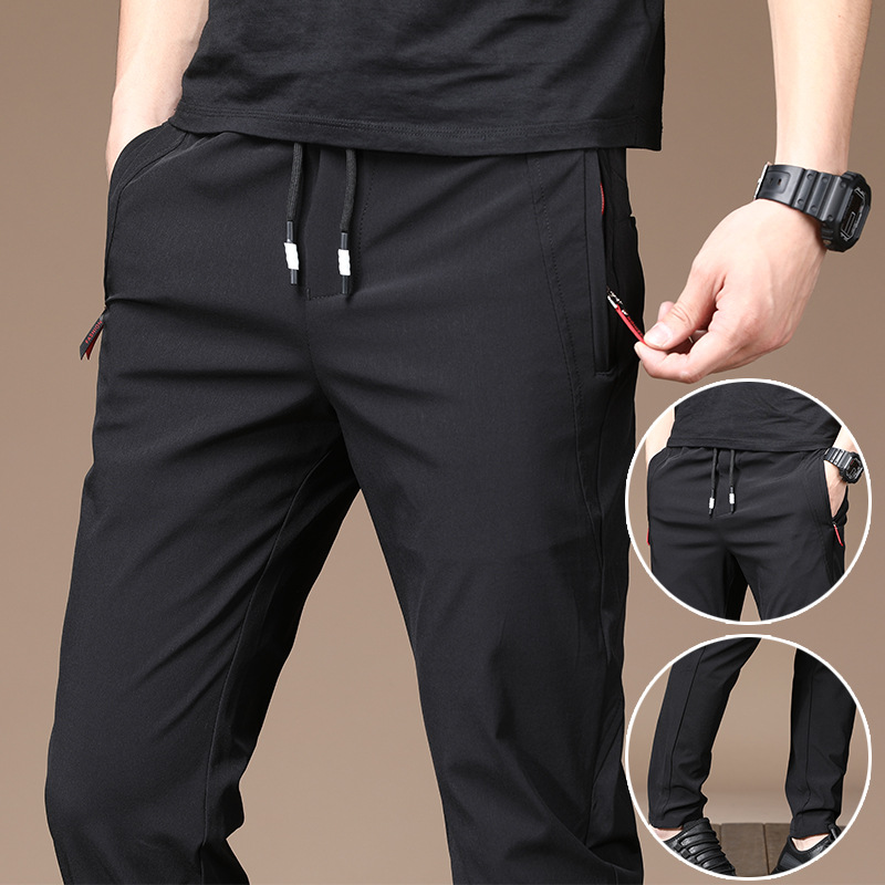 Sporty and casual men's trousers with a slightly elastic waistband, breathable, quick-drying, form-fitting and comfortable. Spring and summer ice silk casual trousers details Picture