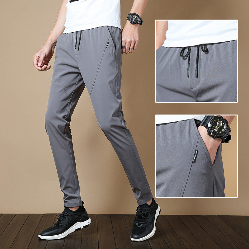 Sporty and casual men's trousers with a slightly elastic waistband, breathable, quick-drying, form-fitting and comfortable. Spring and summer ice silk casual trousers Application Scenario