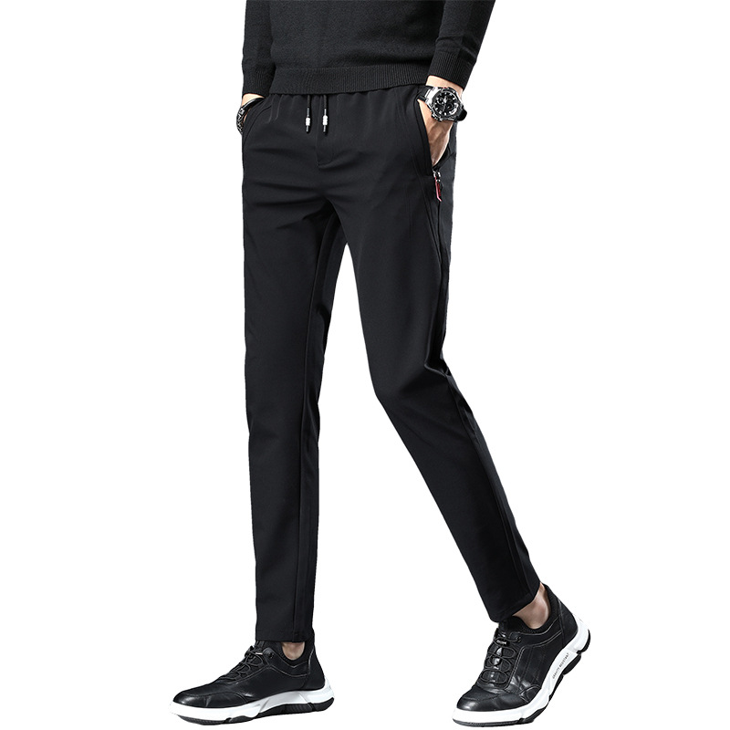 Sporty and casual men's trousers with a slightly elastic waistband, breathable, quick-drying, form-fitting and comfortable. Spring and summer ice silk casual trousers Item Picture