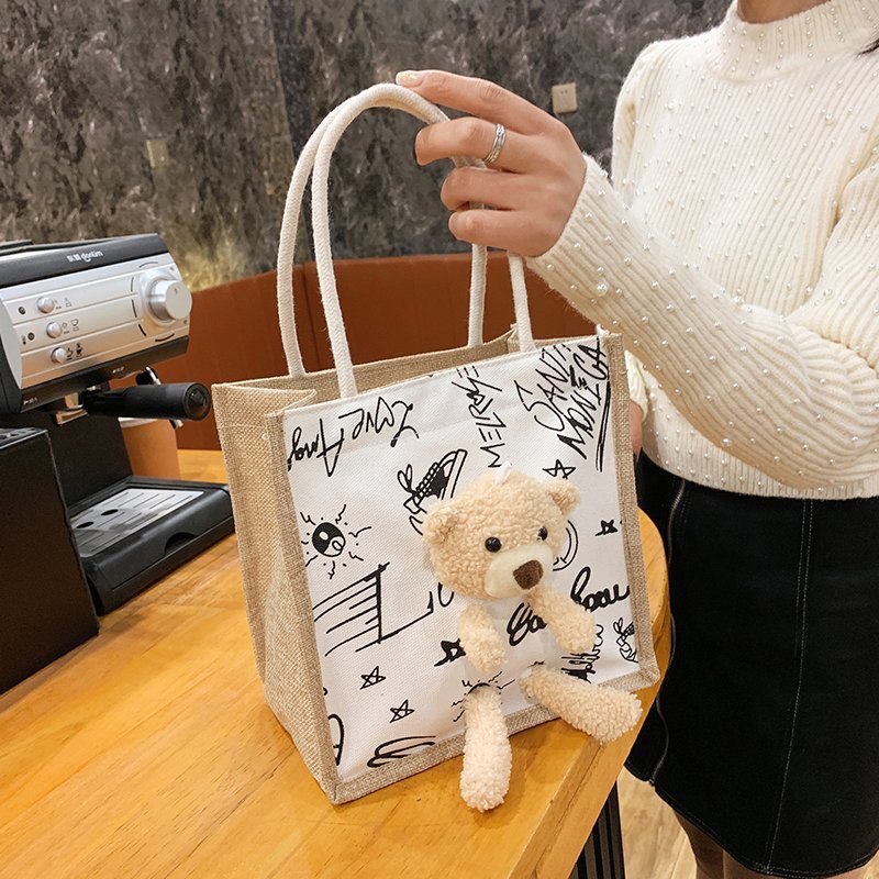 2021 New trendy Korean version Instagram printed cow graffiti bear canvas bag for women, cute and adorable single-shoulder bag Specification image