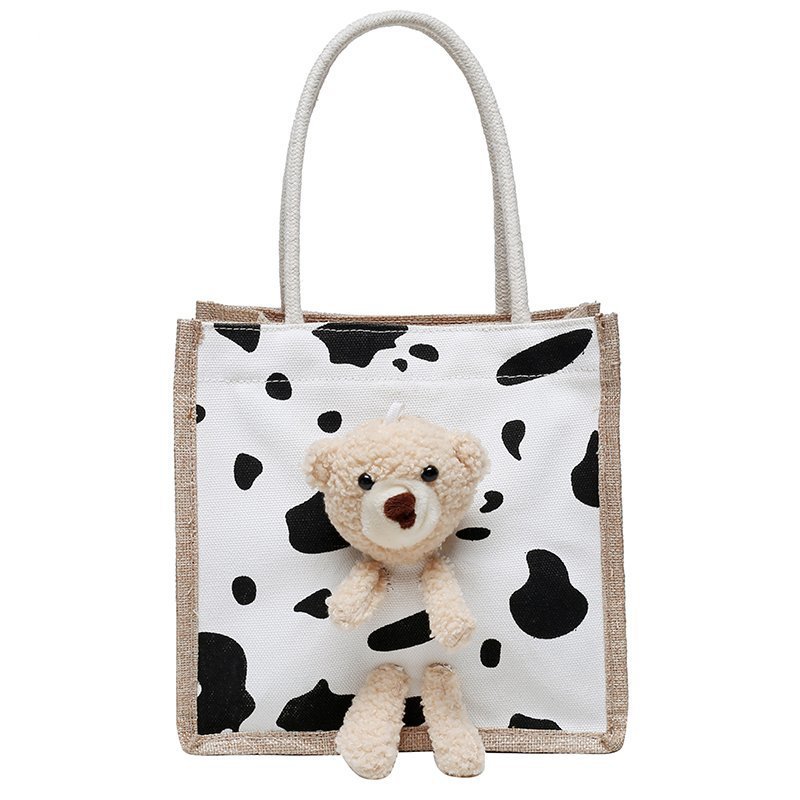 2021 New trendy Korean version Instagram printed cow graffiti bear canvas bag for women, cute and adorable single-shoulder bag Item Picture