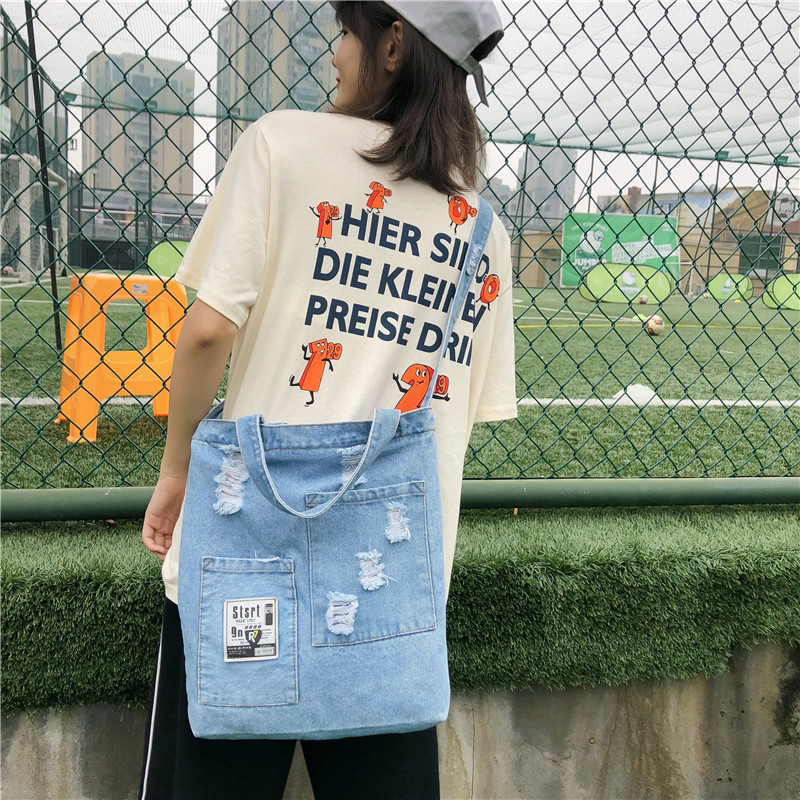 Cross-border 2021 new style denim canvas women's single-shoulder bag, retro style, perforated crossbody, college style bucket bag for women wholesale details Picture