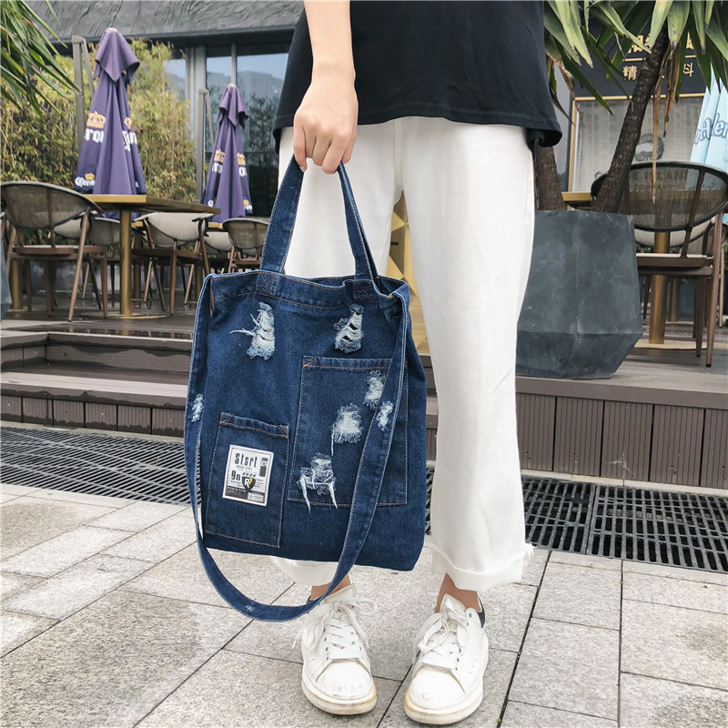 Cross-border 2021 new style denim canvas women's single-shoulder bag, retro style, perforated crossbody, college style bucket bag for women wholesale Specification image