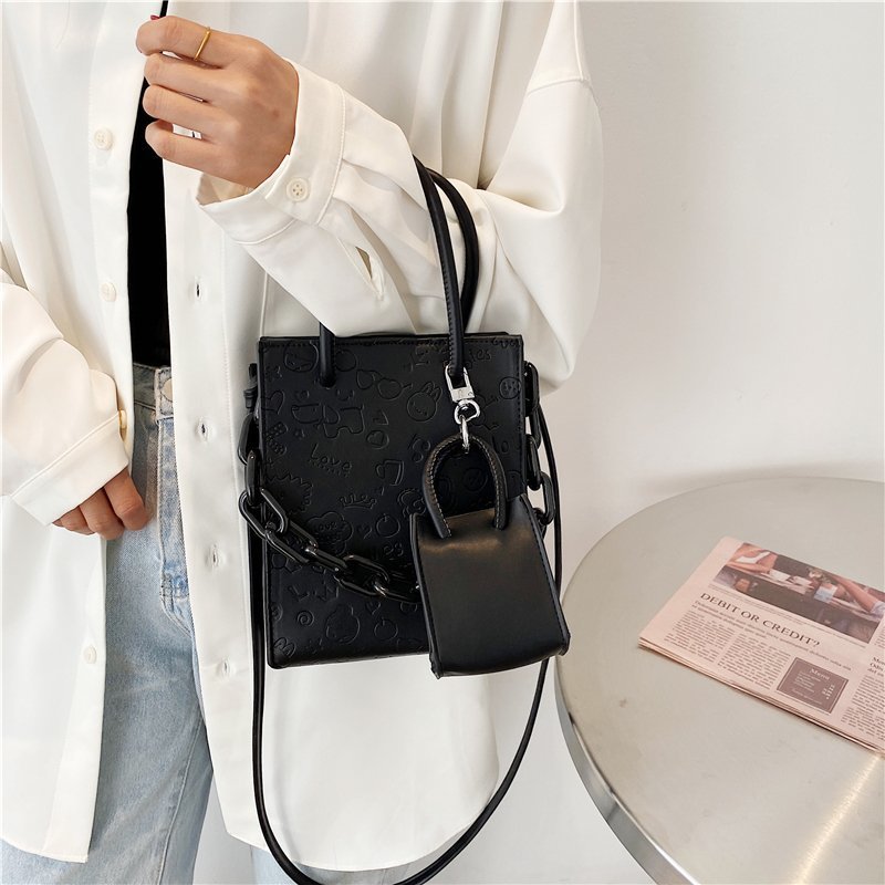 The 2021 new Korean-style trendy, versatile and fashionable niche design single-shoulder crossbody mother-and-child tote bag made of PU Specification image