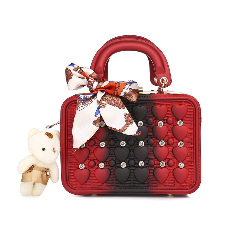 The 2021 Korean version of the trendy tote bag features a ribbon bow, an Instagram niche design with rivets and a slanted crossbody bag made of PU Item Picture