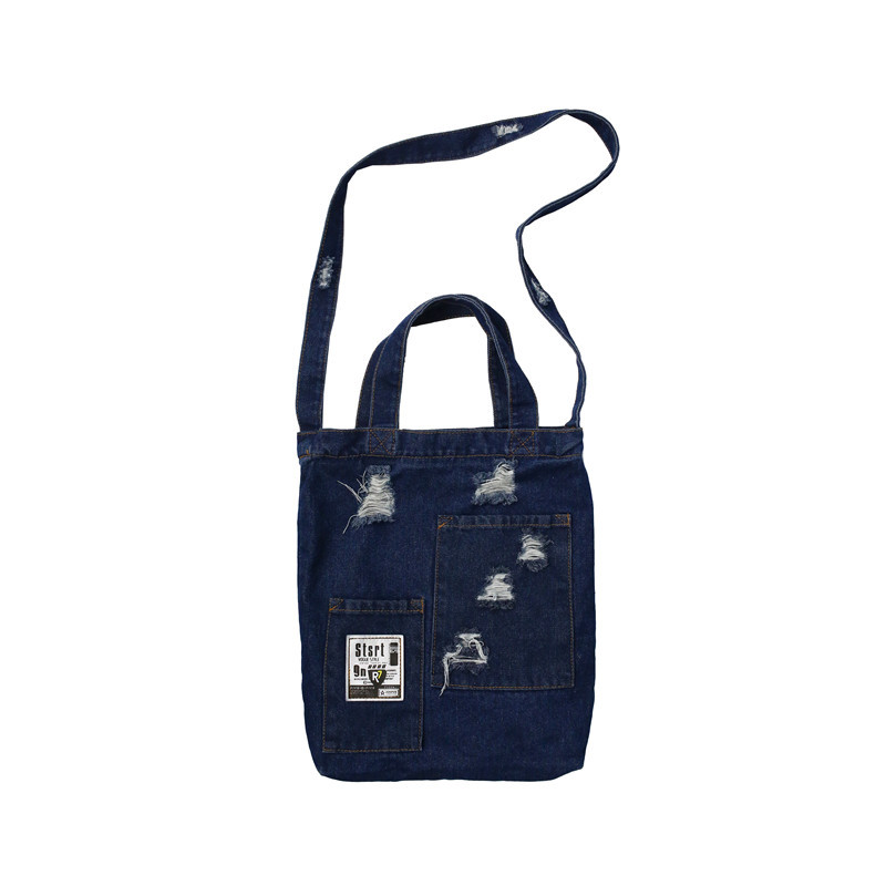 Cross-border 2021 new style denim canvas women's single-shoulder bag, retro style, perforated crossbody, college style bucket bag for women wholesale Item Picture