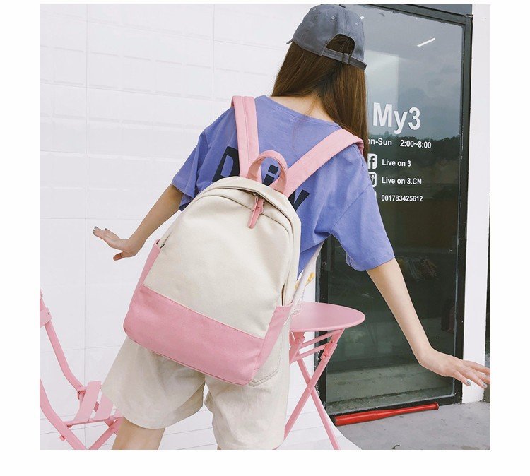 Factory wholesale of college-style, fresh, artistic, simple and versatile canvas backpacks, color-matched schoolbags for middle school best friends Item Picture