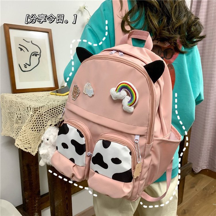 Japanese-style ins campus school style, fresh and cute, cute cow with earbuds, soft girl schoolbag, funny student backpack
