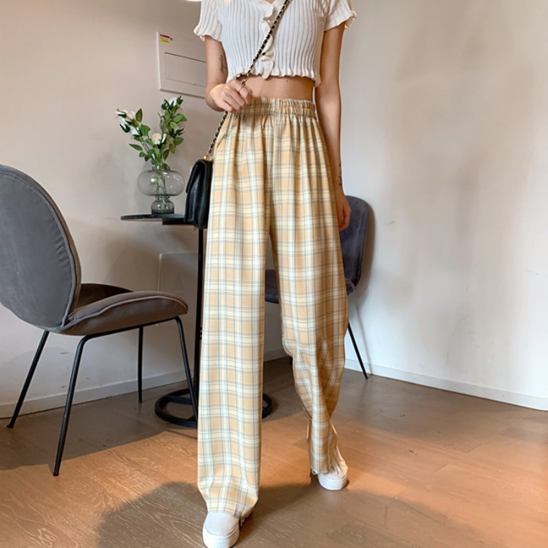 The new autumn straight-leg loose and casual checkered trousers for women are high-waisted and versatile, making them look slimmer. They are wide leg pants with a floor-hugging and stretchy feel details Picture