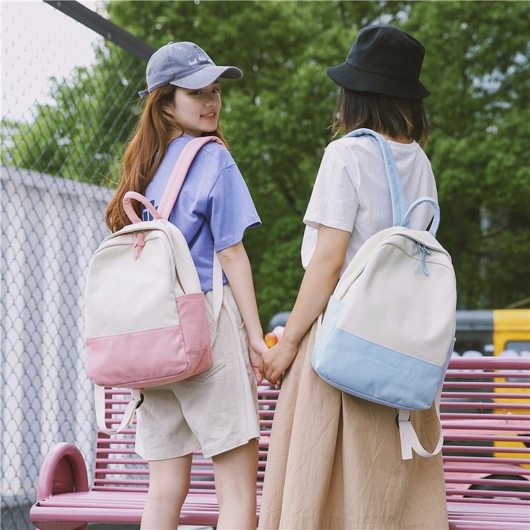 Factory wholesale of college-style, fresh, artistic, simple and versatile canvas backpacks, color-matched schoolbags for middle school best friends