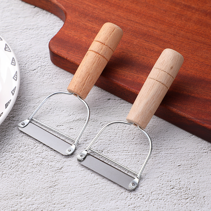 Small wood planer fruit peeling knife wooden handle pulling planer 1 yuan store department store household goods 1 yuan wholesale