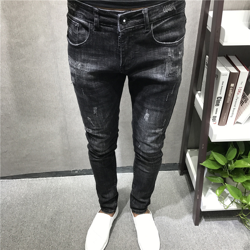 A trendy man in the autumn and winter season, with a new style of slimming, embroidered cat whiskers, black skinny jeans, a socially spirited young man, and a Kuaishou Internet celebrity details Picture