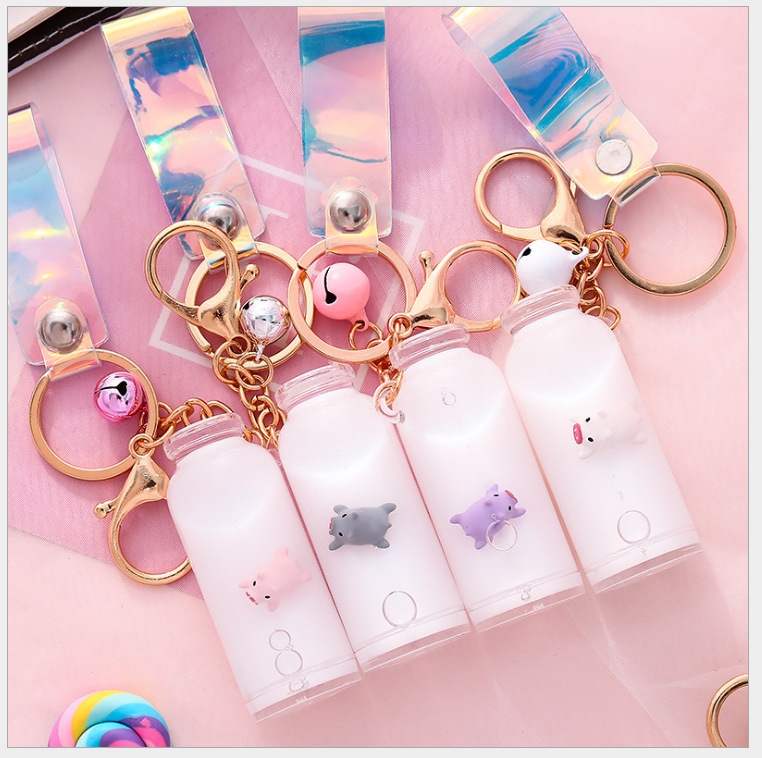 New milk pig bottle oil keychain floating pig sand pendant glass bottle surfing pig bag pendant full figure