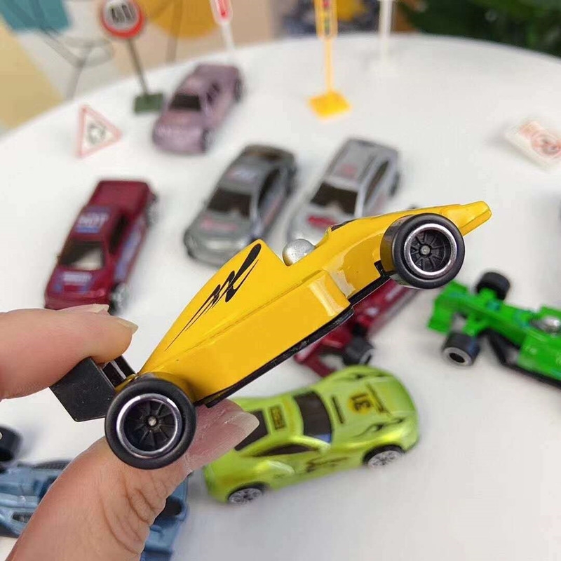 Cross-border best-selling children's simulation mini-game toy cars, cylindrical sliding alloy car racing model toys Application Scenario