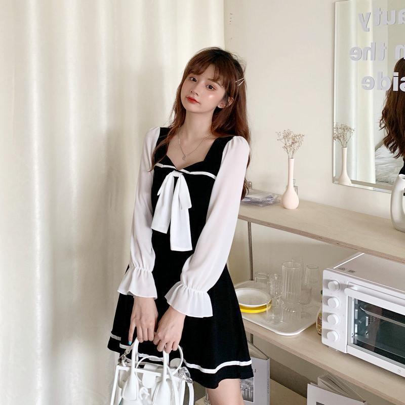 This is a new autumn dress with a sexy square neck and puffed sleeves. It's a long-sleeved dress with a striped bow that makes you look slimmer details Picture