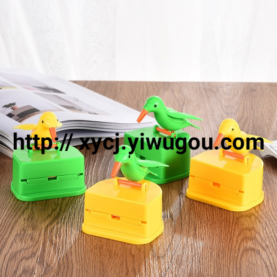Creative personality home automatic press type bird tooth holder