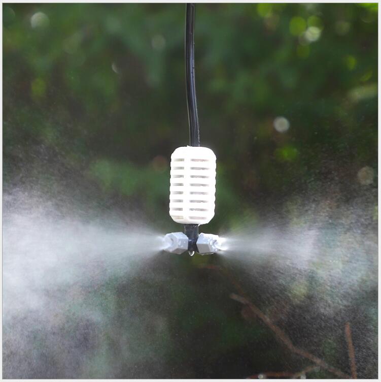 The grey cross-shaped atomizing micro-sprinkler heads are used for cooling and humidifying the roof of the four-outlet greenhouse seedling raising farm Specification drawing