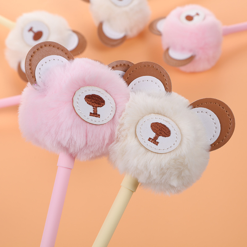 Wholesale of creative cartoon bear pom-ball pens, fluffy and cute ballpoint pens, and student gel pens from South Korea details Picture