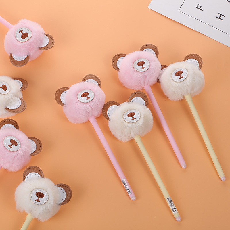 Wholesale of creative cartoon bear pom-ball pens, fluffy and cute ballpoint pens, and student gel pens from South Korea full figure