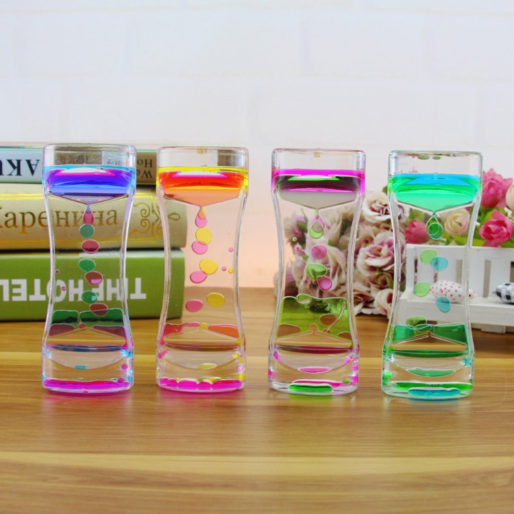 Acrylic plastic double-center oil drip hourglass windmill oil drip with rotating turbine timer liquid supply oil drain details Picture