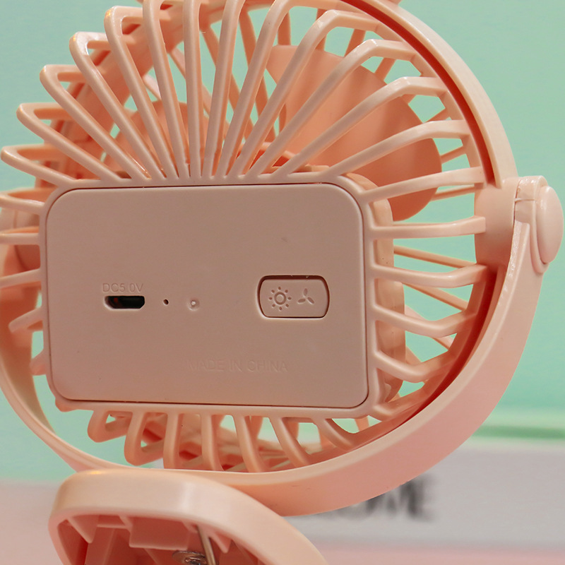 Creative new student dormitory office usb mini handheld clip mini fan, outdoor lighting mini fan Application Scenario