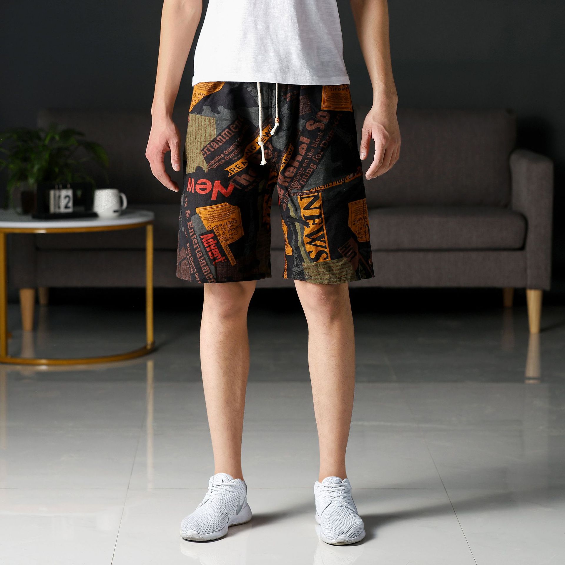 Men's short-sleeved beach pants, summer printed loose underpants, sporty capri pants, cotton and linen fashionable casual shorts Application Scenario
