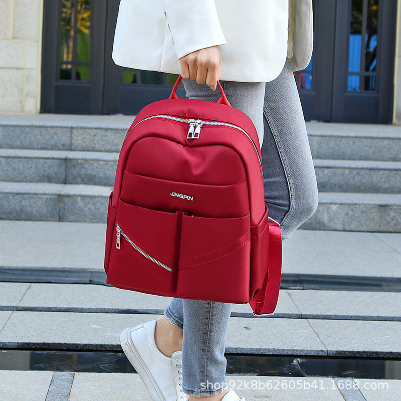 The 2020 new winter Oxford fabric trendy and versatile backpack for girls, featuring a fashionable campus style for junior and senior high school girls Application Scenario