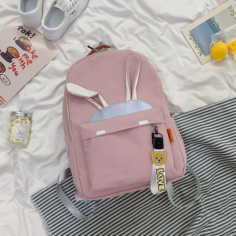 2020 nuevo estilo mochila para las mujeres versión coreana lindo estudiante casual mochila reflectante de gran capacidad versátil bolsa escolar para las mujeres Application Scenario