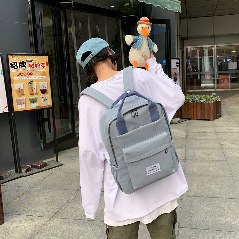 A schoolgirl style casual and simple backpack, canvas backpack, Korean trendy brand, Instagram travel backpack, best friend