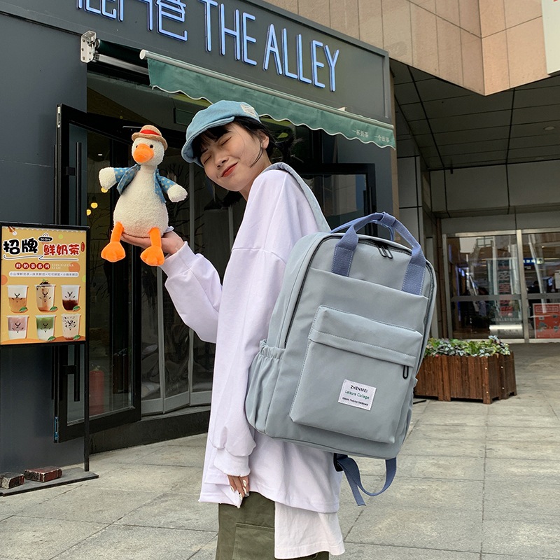 A schoolgirl style casual and simple backpack, canvas backpack, Korean trendy brand, Instagram travel backpack, best friend Application Scenario
