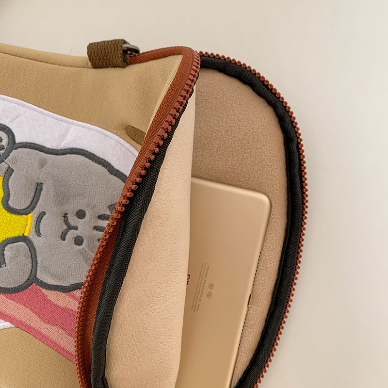 A cute 2021 new computer bag with a Japanese and Korean ins style, featuring an 11-inch tablet ipad inner liner and anti-bending storage protection bag Application Scenario