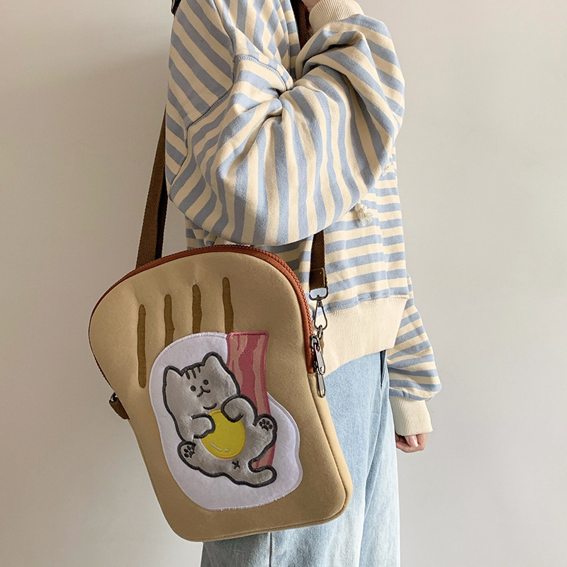 A cute 2021 new computer bag with a Japanese and Korean ins style, featuring an 11-inch tablet ipad inner liner and anti-bending storage protection bag Specification image
