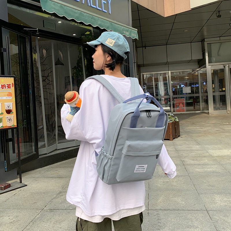 A schoolgirl style casual and simple backpack, canvas backpack, Korean trendy brand, Instagram travel backpack, best friend details Picture
